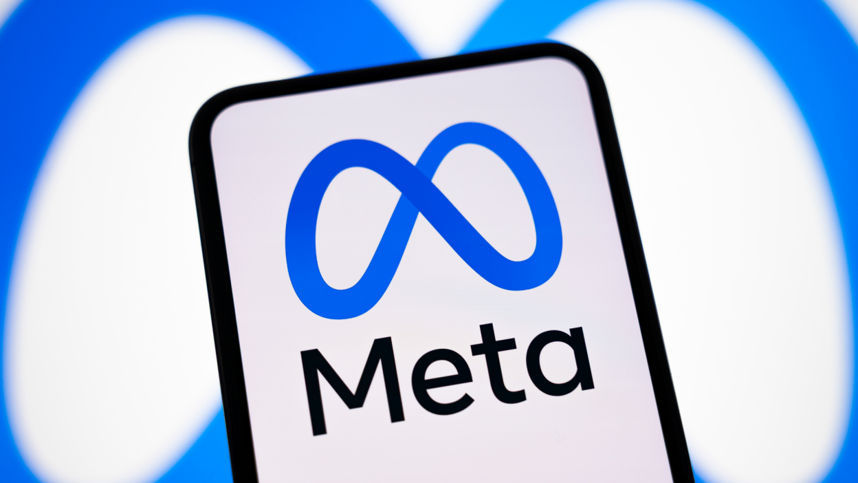 The Meta logo on a smartphone.
