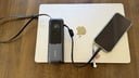 anker laptop power bank plugged into macbook and iphone
